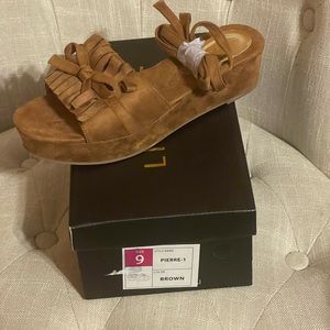 Ladies size 9.0 Brown Suede Lace up the leg sandal